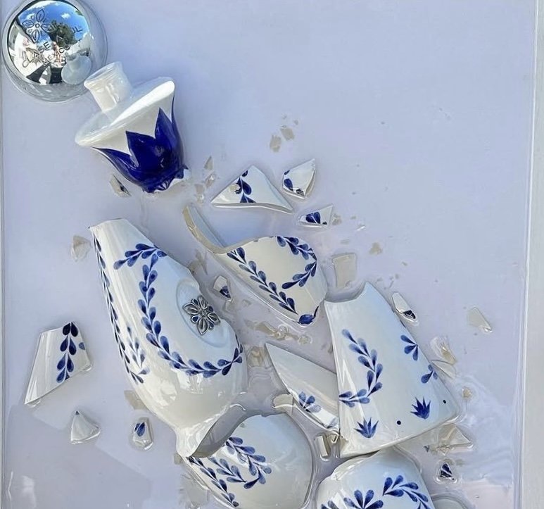 Blue and white ceramic bottle preserved in resin