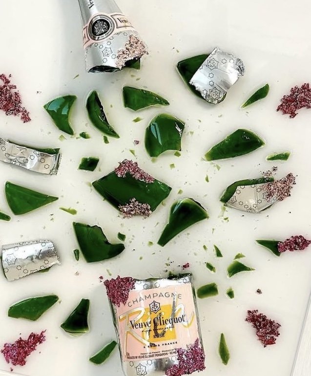 Veuve Clicquot rose champagne preserved with green glass and rose leaf